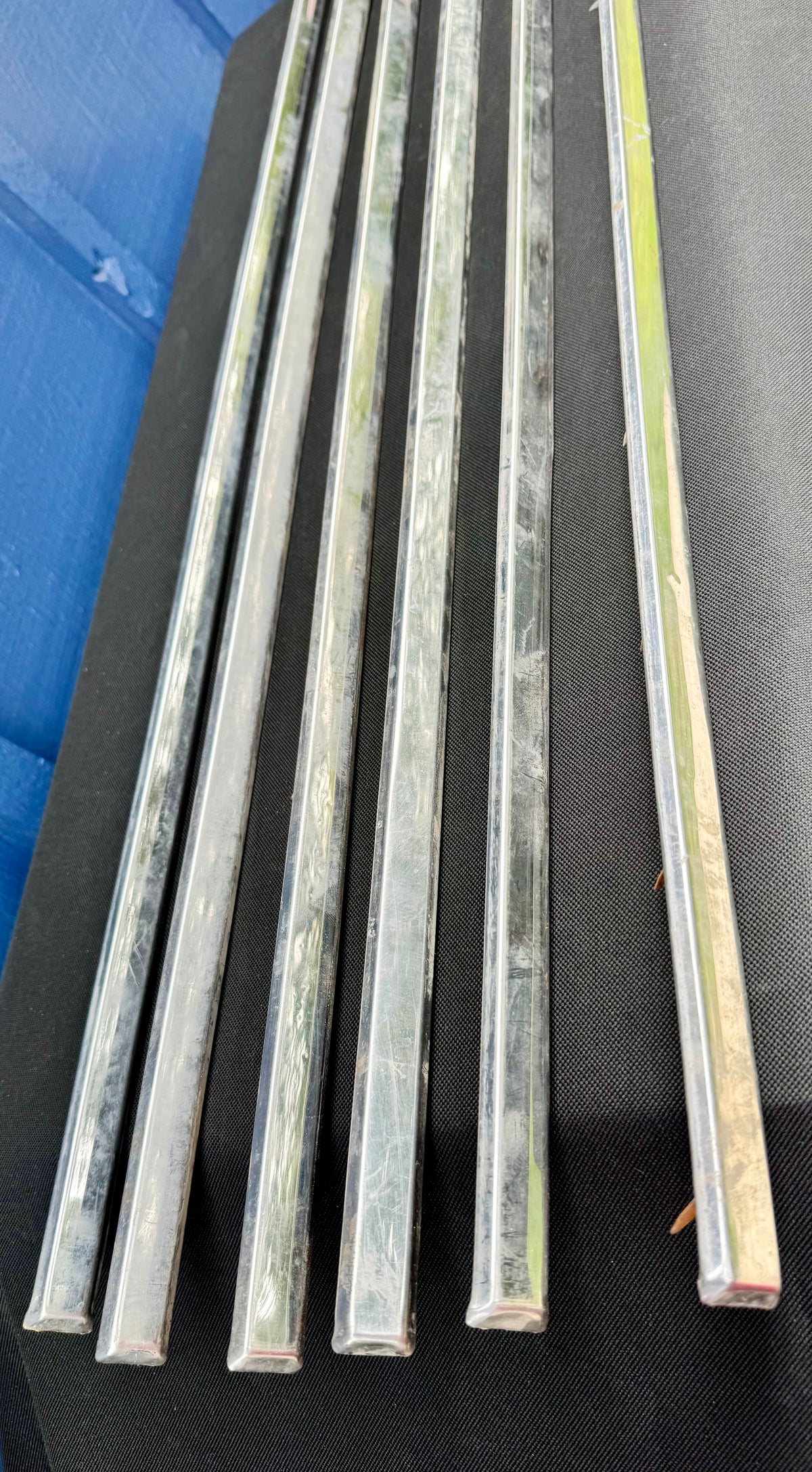 Front door carpet chrome trim