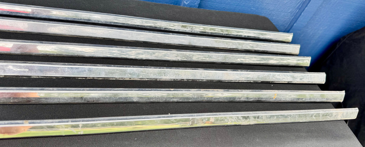 Front door carpet chrome trim