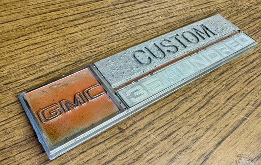 1973-74 GMC fender emblem